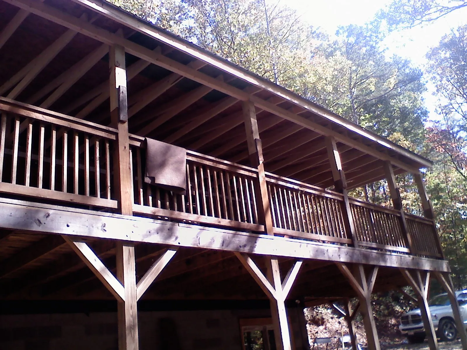 Timber framing under a new elevated porch and deck — Roof Leak Repair in Gladbrook by Roofing Brothers